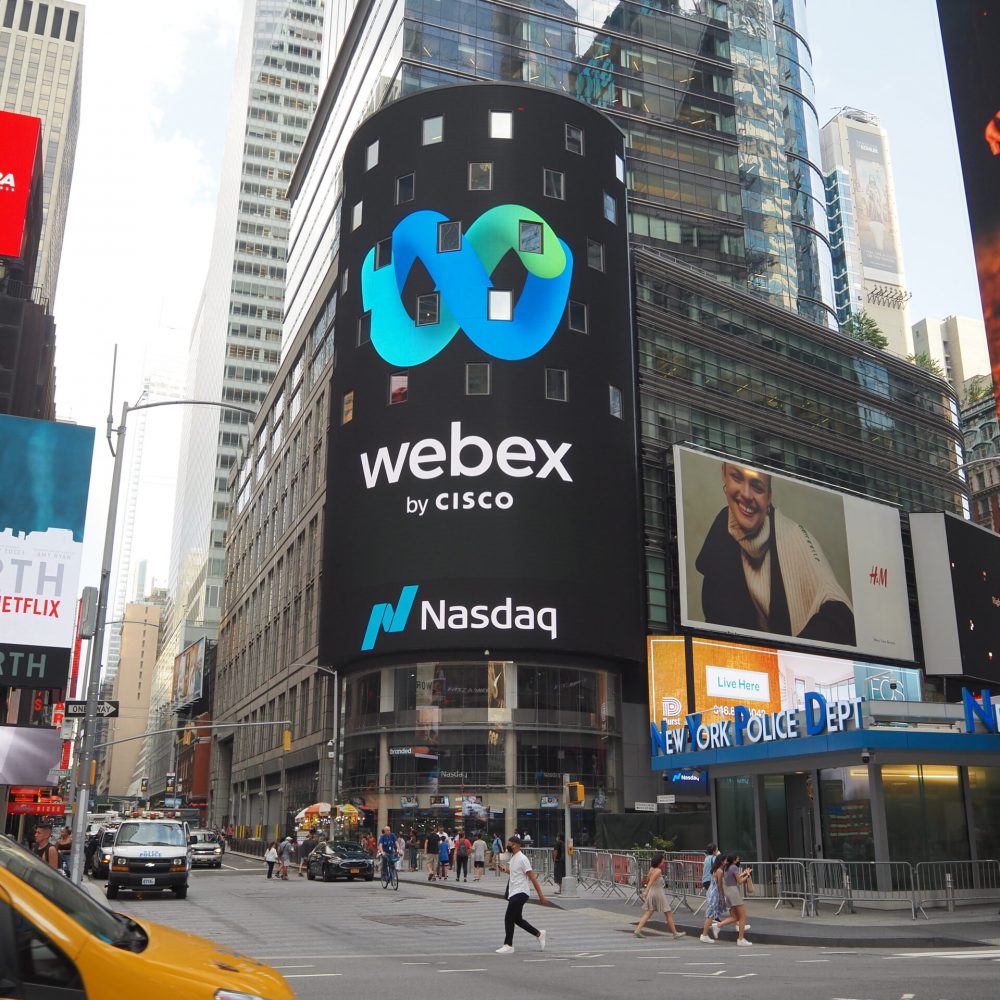 New York City, New York United States - August 29 2021: NASDAQ, National Association of Securities Dealers Automated Quotations and Cisco Webex corporate logo sign near Times Square.